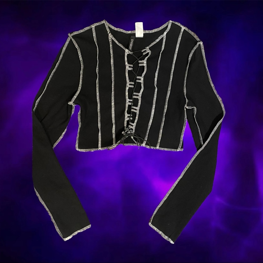 Long sleeve black lace-up crop top with white contrast stitching by Divided:)